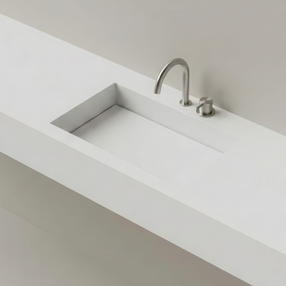 Beckentyp Plano - eckige Beckenmulde mit integrierter Corian-Abdeckung, die den Ablauf verdeckt